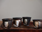Embossed Face Woodfired Teacup