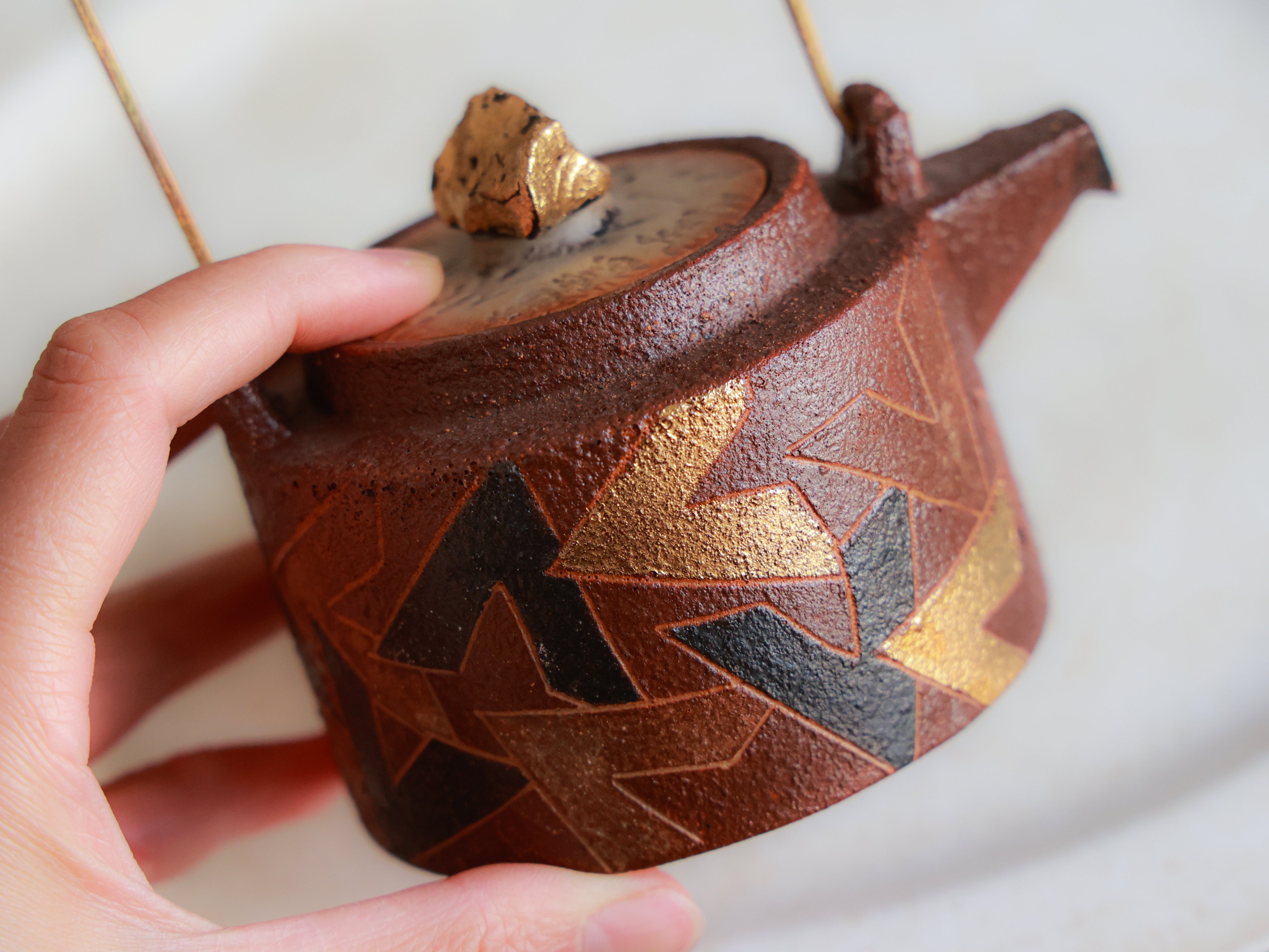 Hand-carved Overhead Teapot
